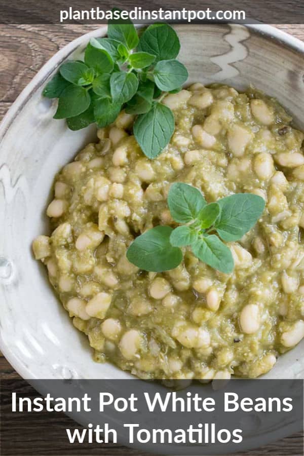 Instant Pot White Beans with Tomatillos in a Handmade White Pottery Bowl