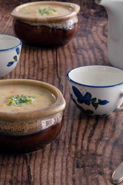 Easy Instant Pot Corn Chowder set up in bowls for two with tea
