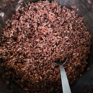 Instant pot of cooked pink rice